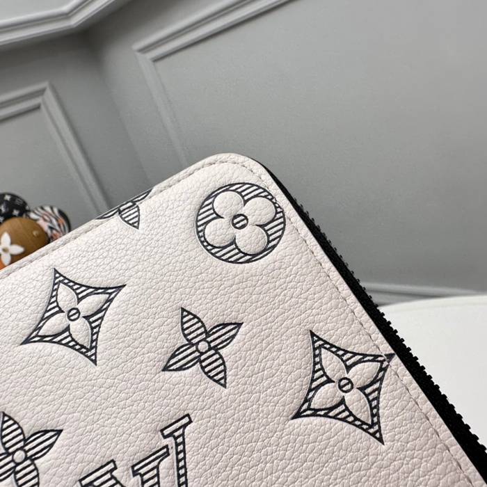 LOUIS VUITTON M83381 縦型ジッピー長財布 モノグラムシャドウ アイボリー サイズ:20x10cm